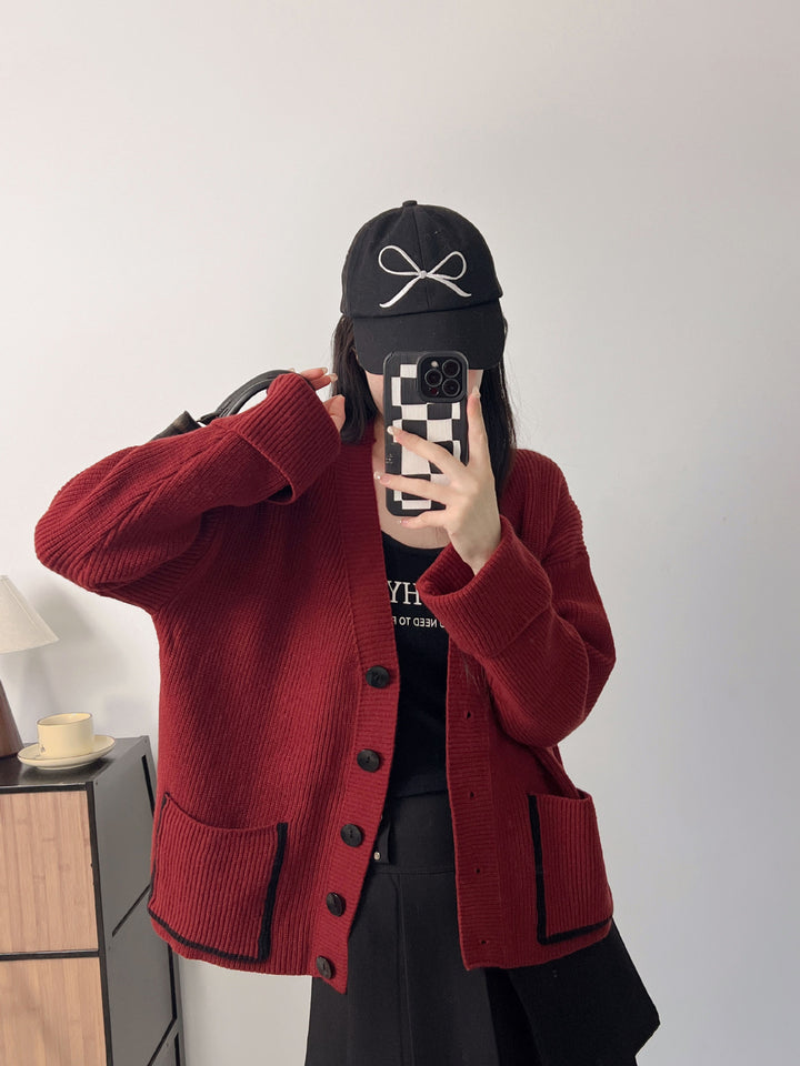 Damer Grovstickad Cardigan med Djupa Fickor och Elegant Knapplist Mirla-Eva Jonsson