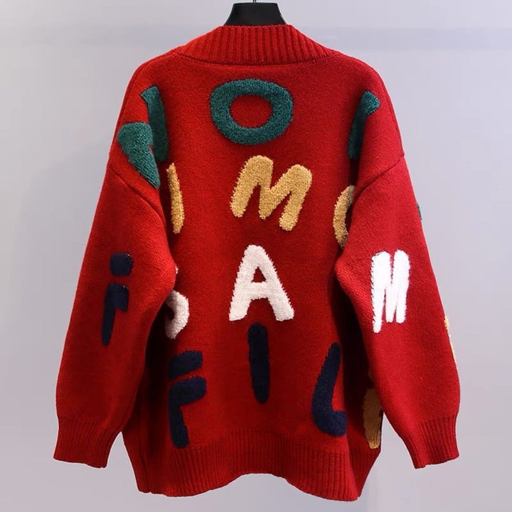 Damer Grovstickad Cardigan med Kreativa Applikationer och Stora Fickor Mirla-Eva Jonsson