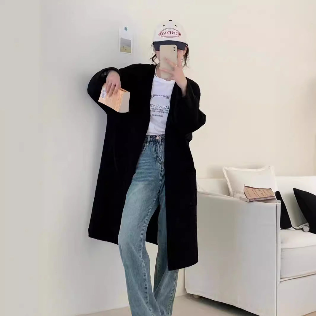 Damer Grovstickad Cardigan med avslappnade fickor och öppen design Mirla-Eva Jonsson