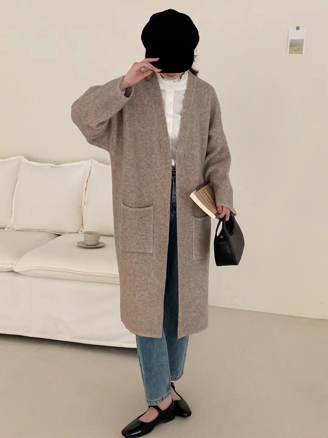 Damer Grovstickad Cardigan med avslappnade fickor och öppen design Mirla-Eva Jonsson