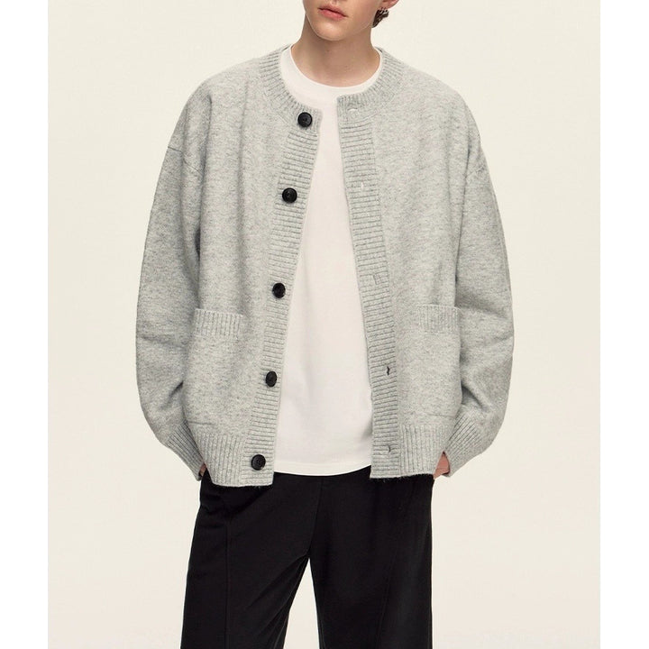 Damer Grovstickad Cardigan med oversize passform och stora knappdetaljer Mirla-Eva Jonsson
