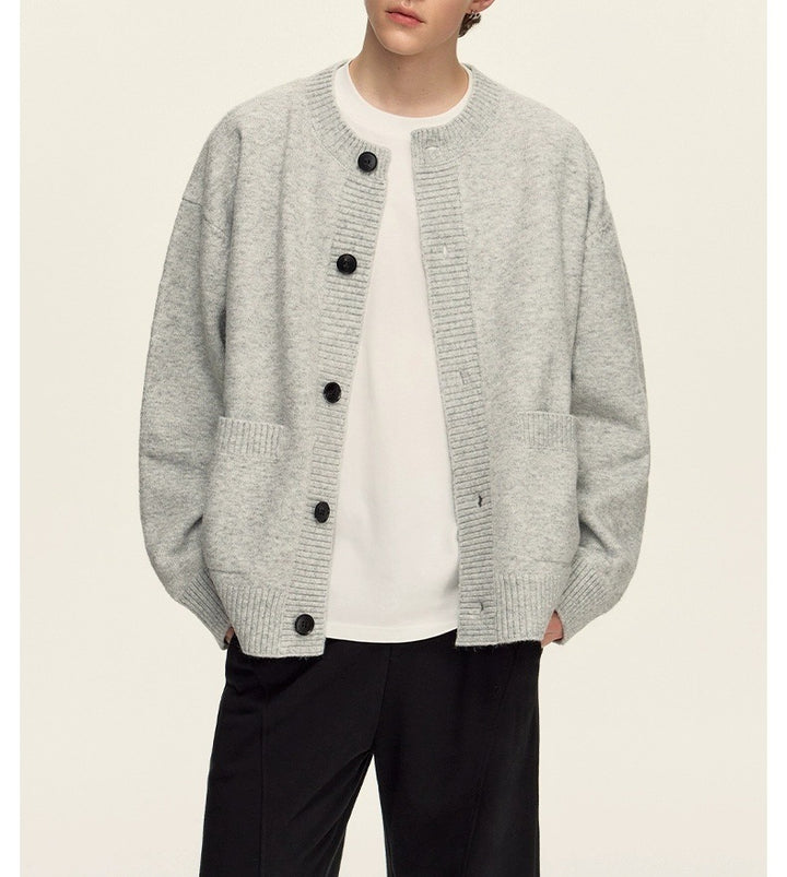 Damer Grovstickad Cardigan med oversize passform och stora knappdetaljer Mirla-Eva Jonsson