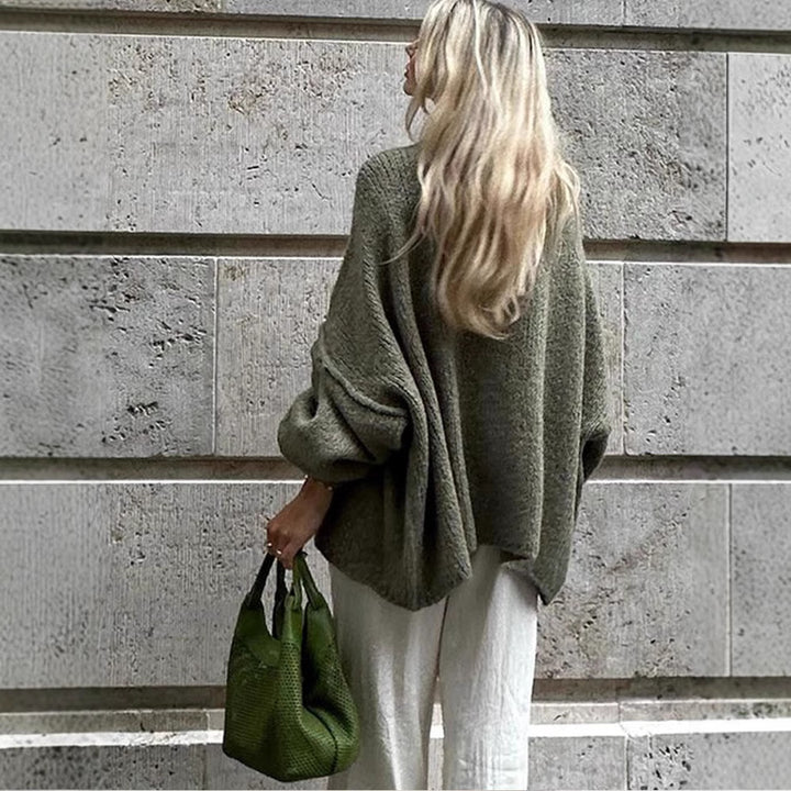 Damer Grovstickad jacka med eleganta knapppdetaljer och avslappnad oversized passform Mirla-Eva Jonsson