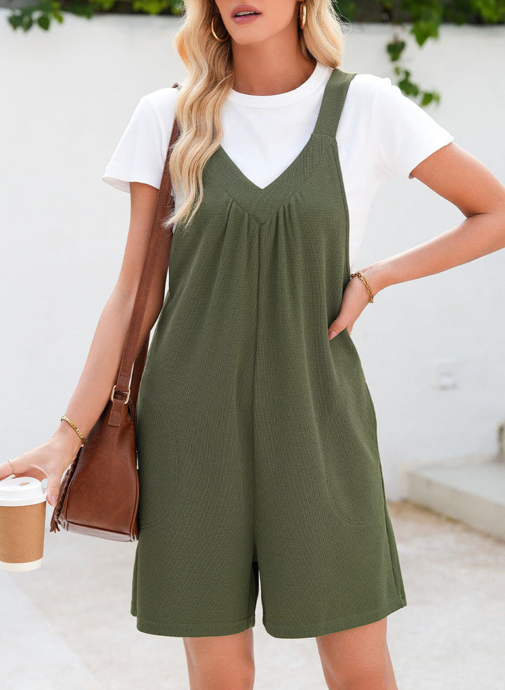 Damer Hel jumpsuit med djup V-ringning och praktiska fickor Mirla-Eva Jonsson