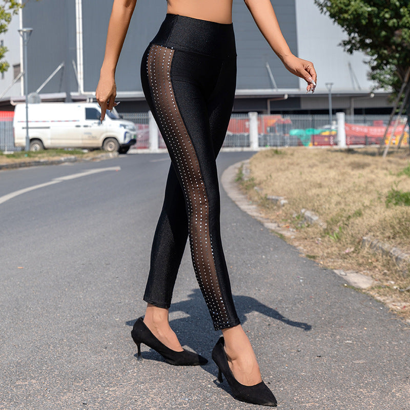 Damer Högglansande Leggings med transparenta mesh-insatser och strass-detalj Mirla-Eva Jonsson