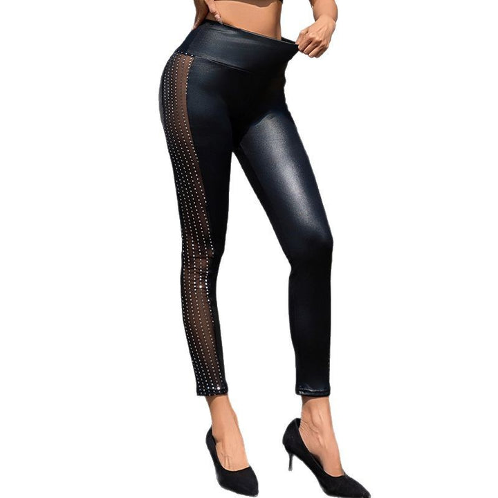 Damer Högglansande Leggings med transparenta mesh-insatser och strass-detalj Mirla-Eva Jonsson