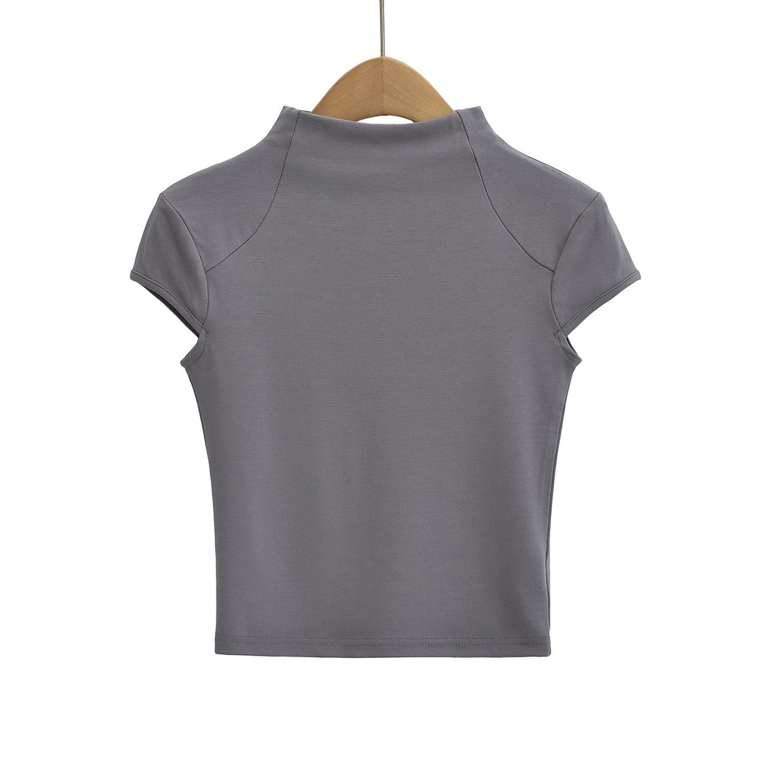 Damer Högkvalitativ Kortärmad T-shirt med Ståkrage och Figurformande Skärning Mirla-Eva Jonsson