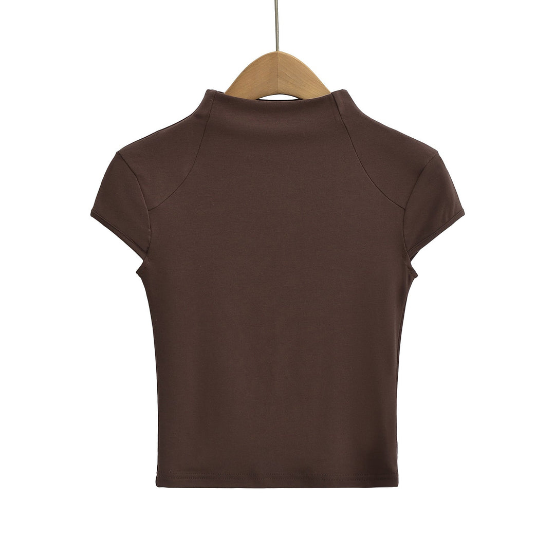 Damer Högkvalitativ Kortärmad T-shirt med Ståkrage och Figurformande Skärning Mirla-Eva Jonsson