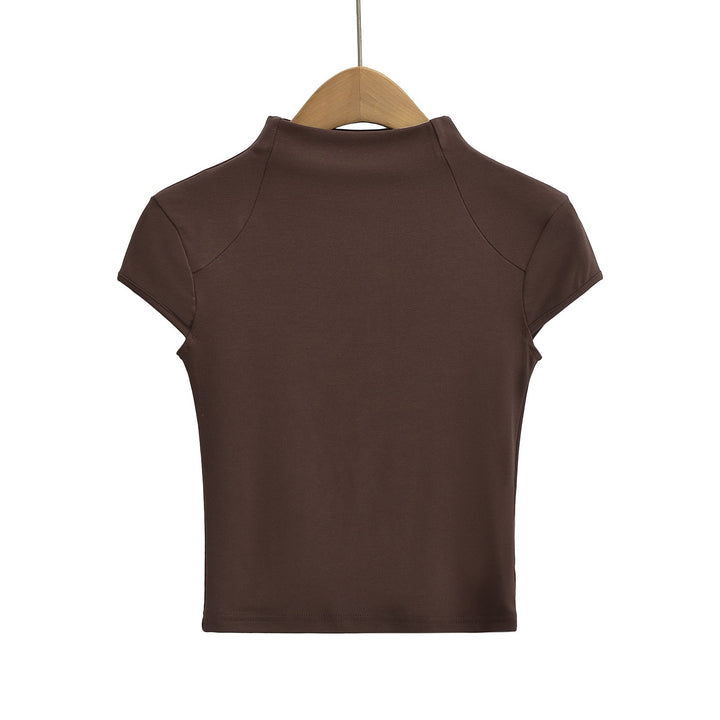 Damer Högkvalitativ Kortärmad T-shirt med Ståkrage och Figurformande Skärning Mirla-Eva Jonsson