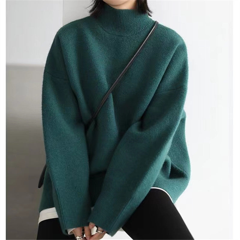 Damer Högkvalitativ rullkragesweater med oversized passform och eleganta ärmslut Eva Jonsson-Eva Jonsson