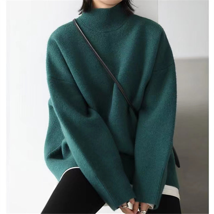 Damer Högkvalitativ rullkragesweater med oversized passform och eleganta ärmslut Eva Jonsson-Eva Jonsson