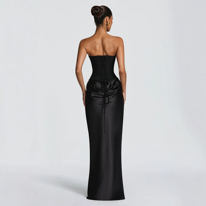 Damer Högkvalitativt kvällsklänning med elegant bustier-topp och draperad kjol Mirla-Eva Jonsson