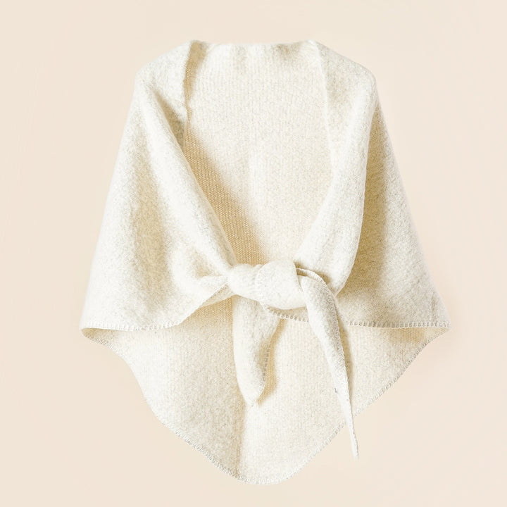 Damer KRAMMIG Wrap poncho med moderna fransar och elegant design Mirla-Eva Jonsson