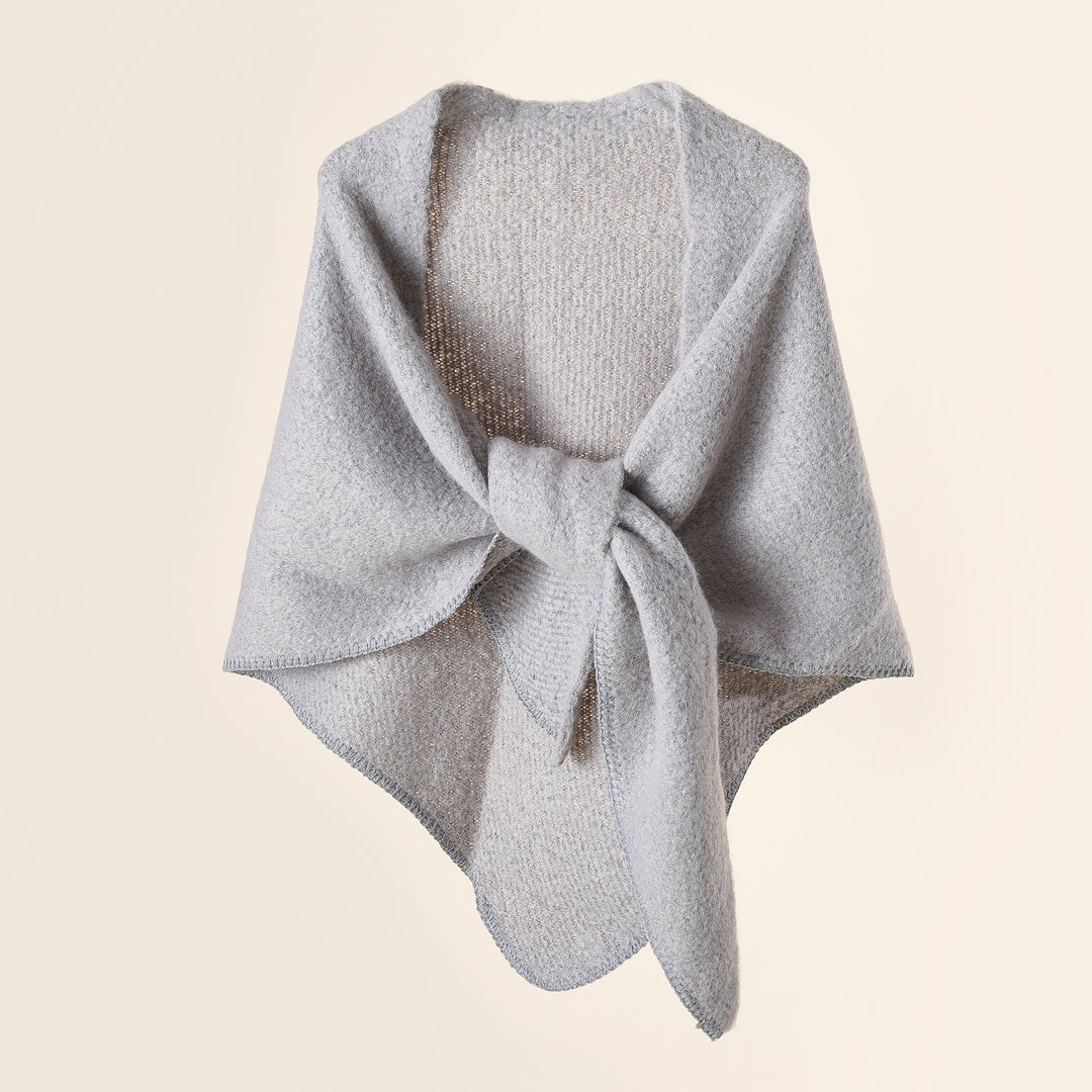 Damer KRAMMIG Wrap poncho med moderna fransar och elegant design Mirla-Eva Jonsson