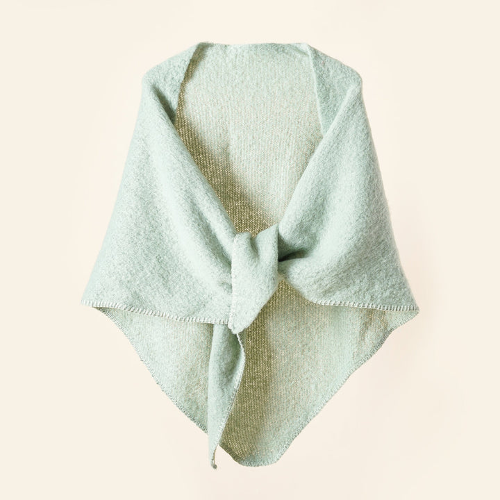 Damer KRAMMIG Wrap poncho med moderna fransar och elegant design Mirla-Eva Jonsson