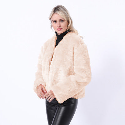 Damer Kort Konstpälsjacka med modern skärning och brett skurna ärmar Eva Jonsson-Eva Jonsson