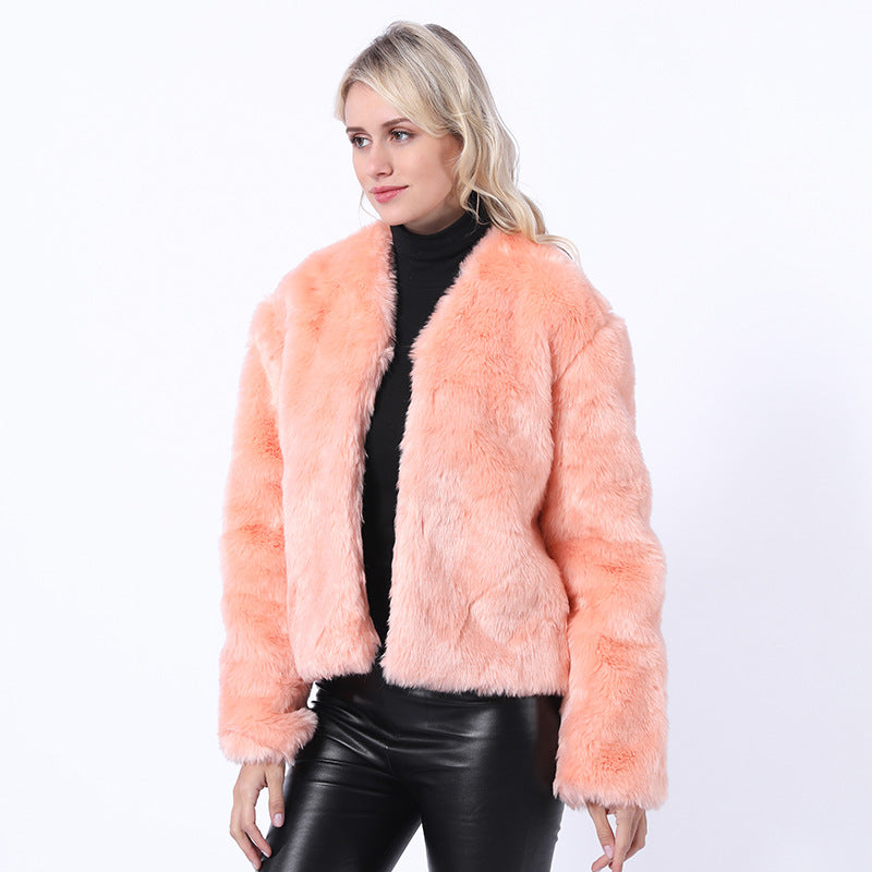 Damer Kort Konstpälsjacka med modern skärning och brett skurna ärmar Eva Jonsson-Eva Jonsson