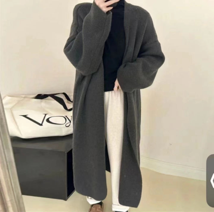 Damer Lång Ullrock i minimalistisk stil med bred passform och eleganta detaljer Eva Jonsson-Eva Jonsson