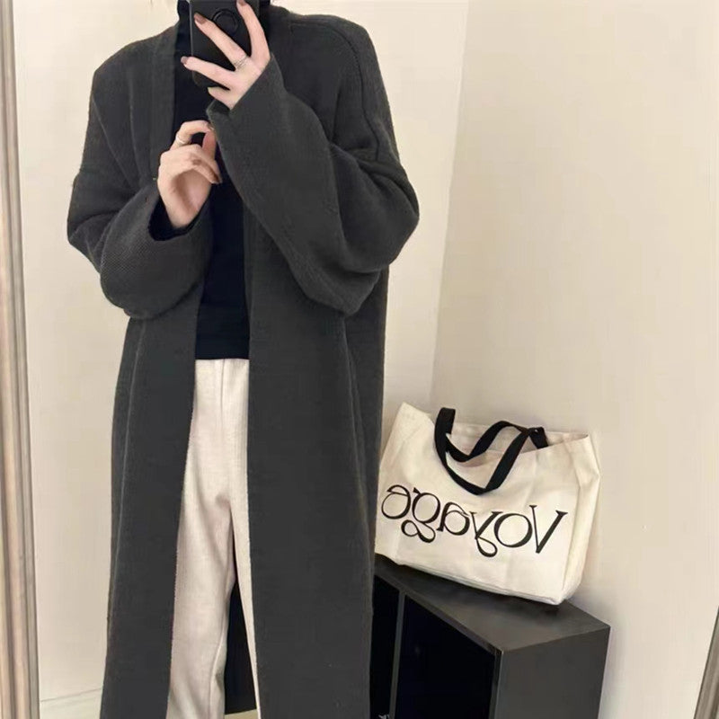 Damer Lång Ullrock i minimalistisk stil med bred passform och eleganta detaljer Eva Jonsson-Eva Jonsson