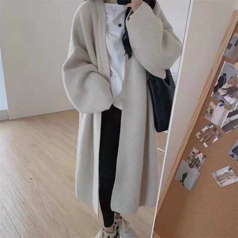 Damer Lång Ullrock i minimalistisk stil med bred passform och eleganta detaljer Eva Jonsson-Eva Jonsson