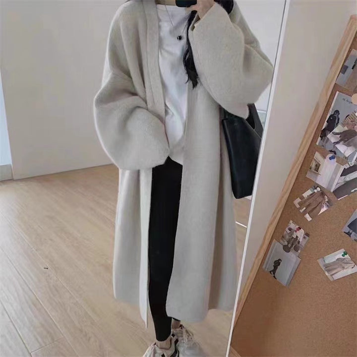 Damer Lång Ullrock i minimalistisk stil med bred passform och eleganta detaljer Eva Jonsson-Eva Jonsson