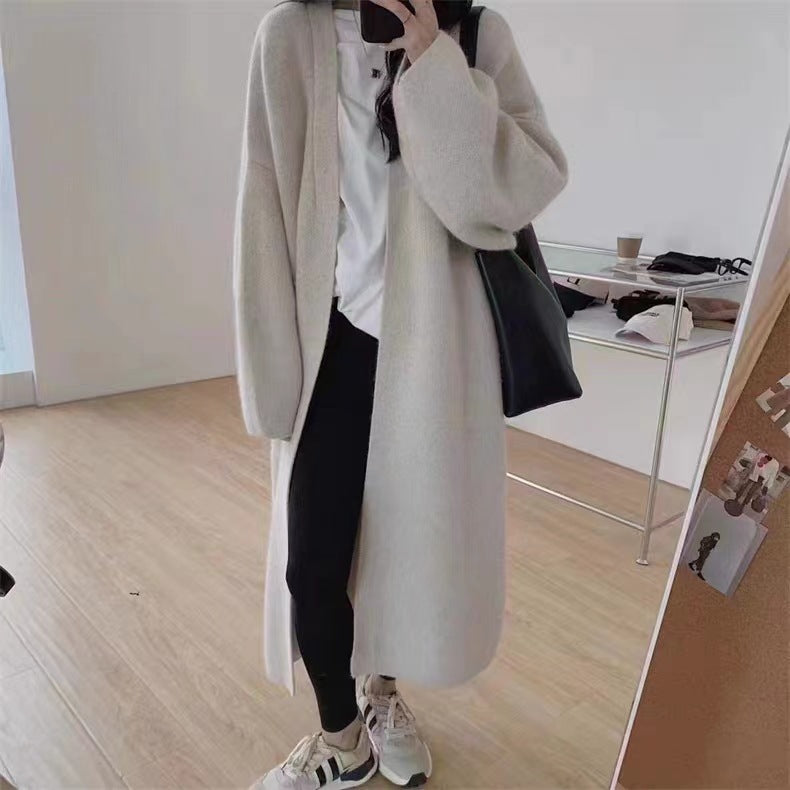 Damer Lång Ullrock i minimalistisk stil med bred passform och eleganta detaljer Eva Jonsson-Eva Jonsson
