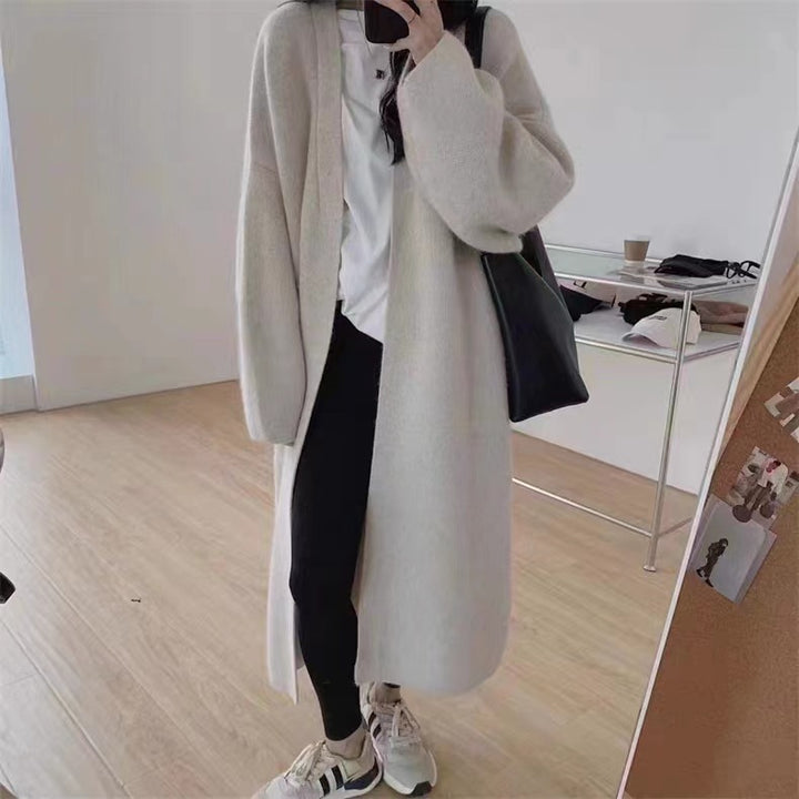 Damer Lång Ullrock i minimalistisk stil med bred passform och eleganta detaljer Eva Jonsson-Eva Jonsson