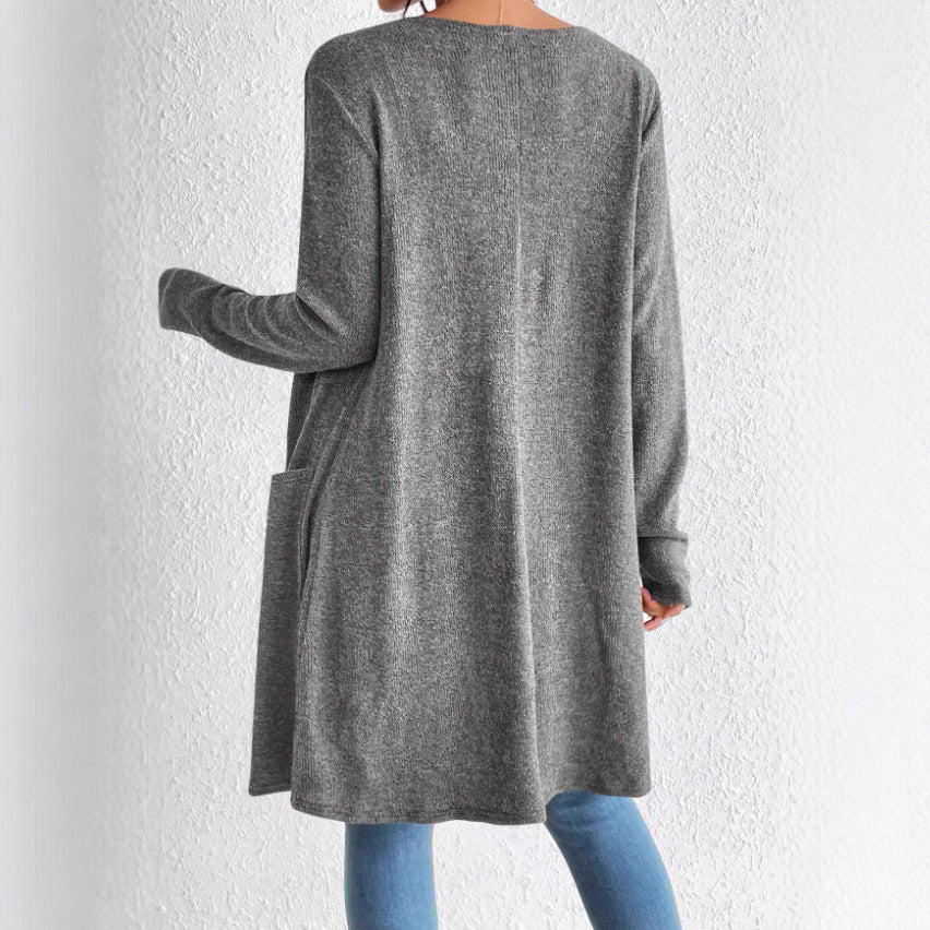 Damer Lång stickad cardigan med praktiska fickor Mirla-Eva Jonsson