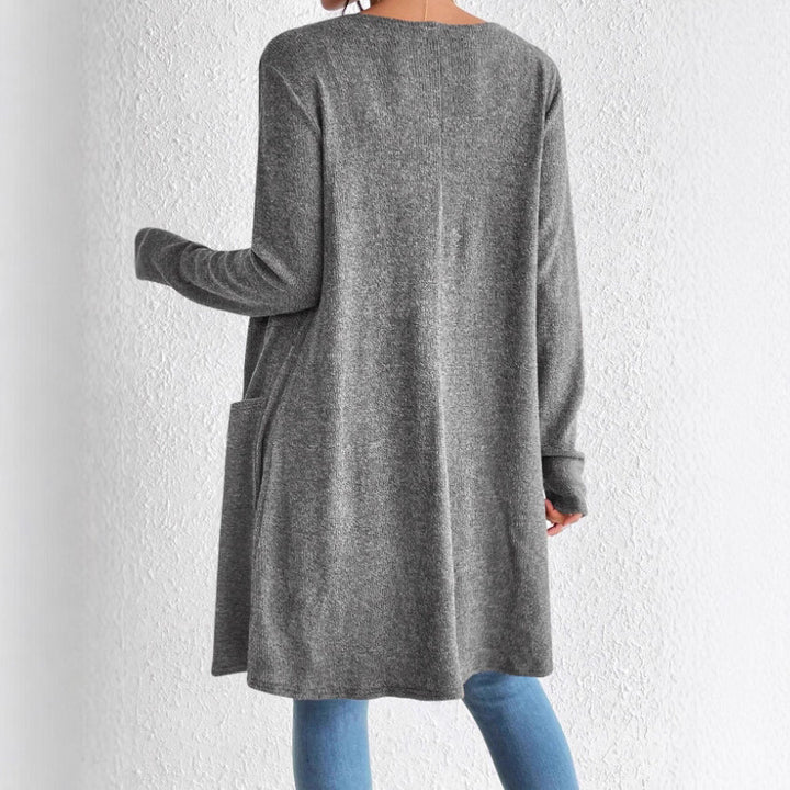Damer Lång stickad cardigan med praktiska fickor Mirla-Eva Jonsson