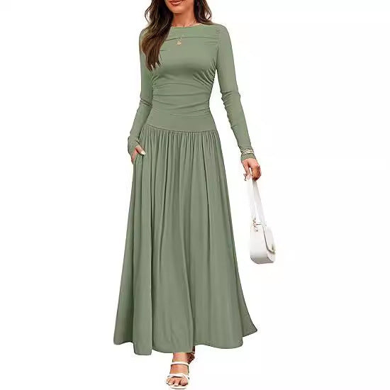 Damer Långärmad Maxiklänning med eleganta Volangdetaljer och praktiska Fickor Mirla-Eva Jonsson