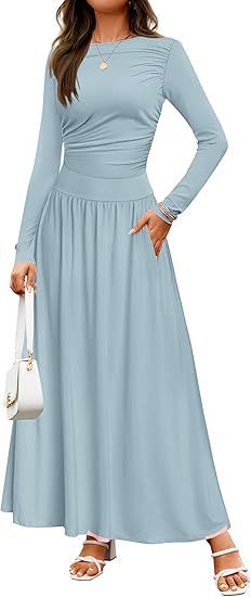 Damer Långärmad Maxiklänning med eleganta Volangdetaljer och praktiska Fickor Mirla-Eva Jonsson