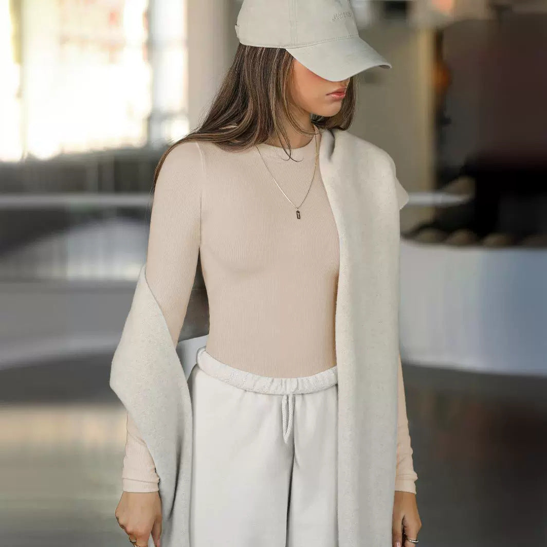 Damer Långärmad Ribbad Topp med Elegant Rundhals och Figurformande Skärning Mirla-Eva Jonsson