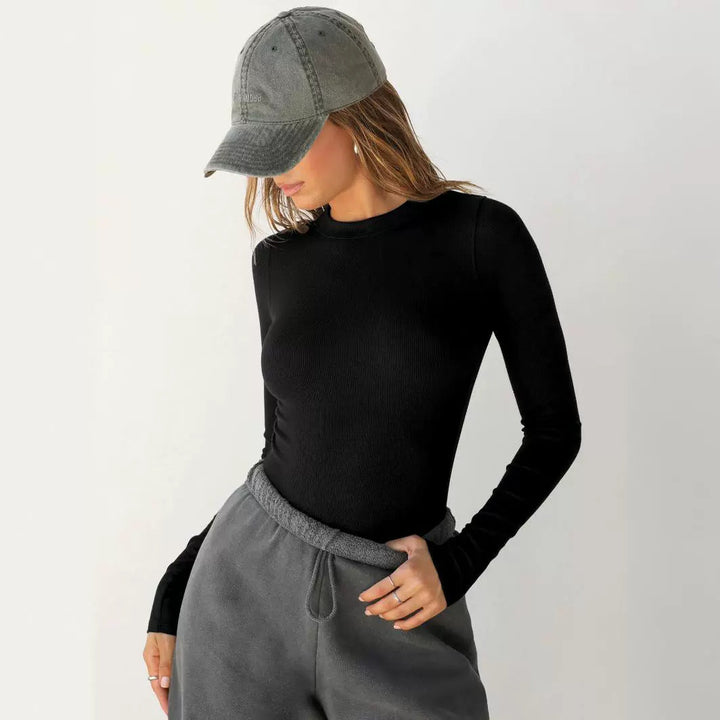 Damer Långärmad Ribbad Topp med Elegant Rundhals och Figurformande Skärning Mirla-Eva Jonsson