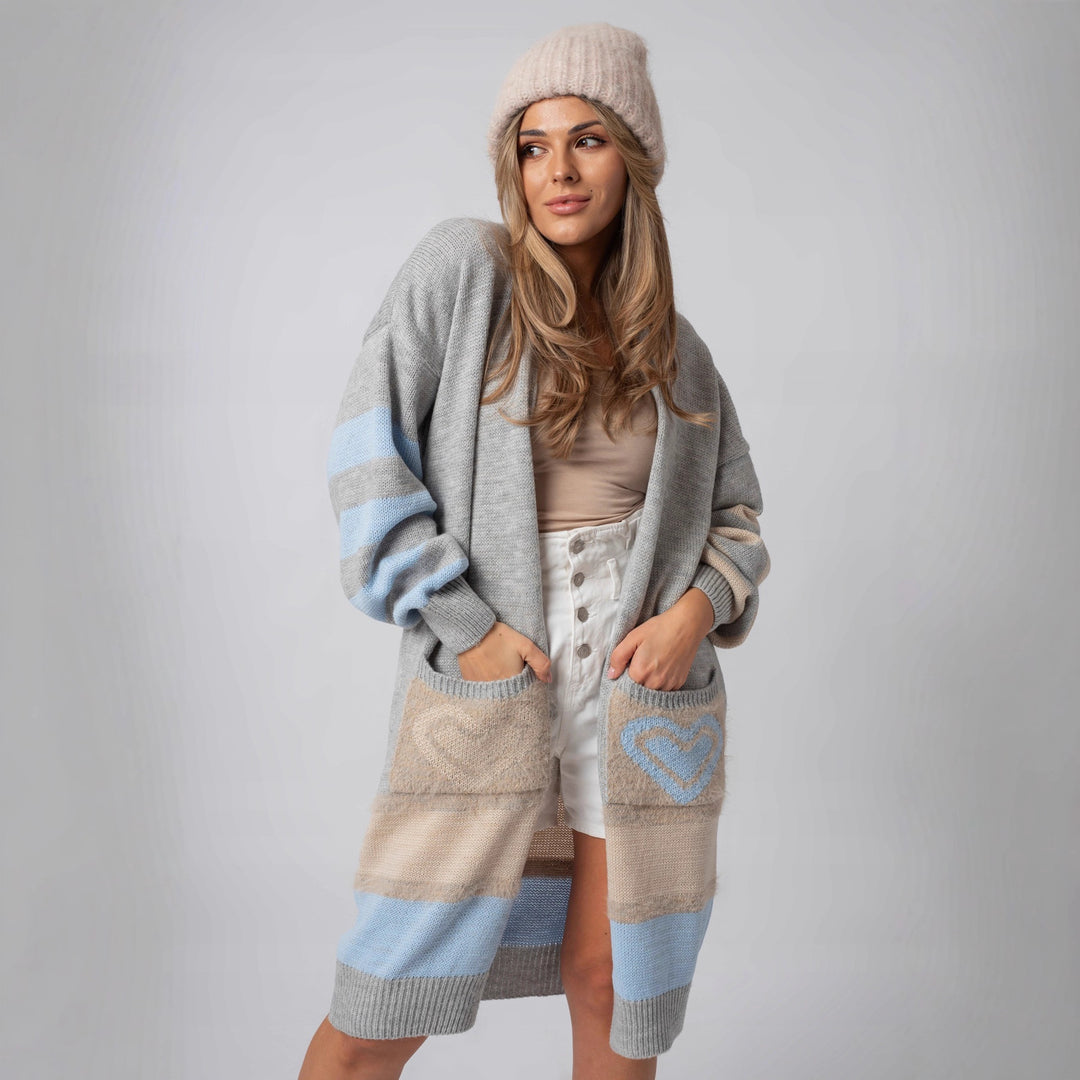 Damer Långärmad Stickad cardigan med hjärtformade fickor och modern färgblockering Mirla-Eva Jonsson