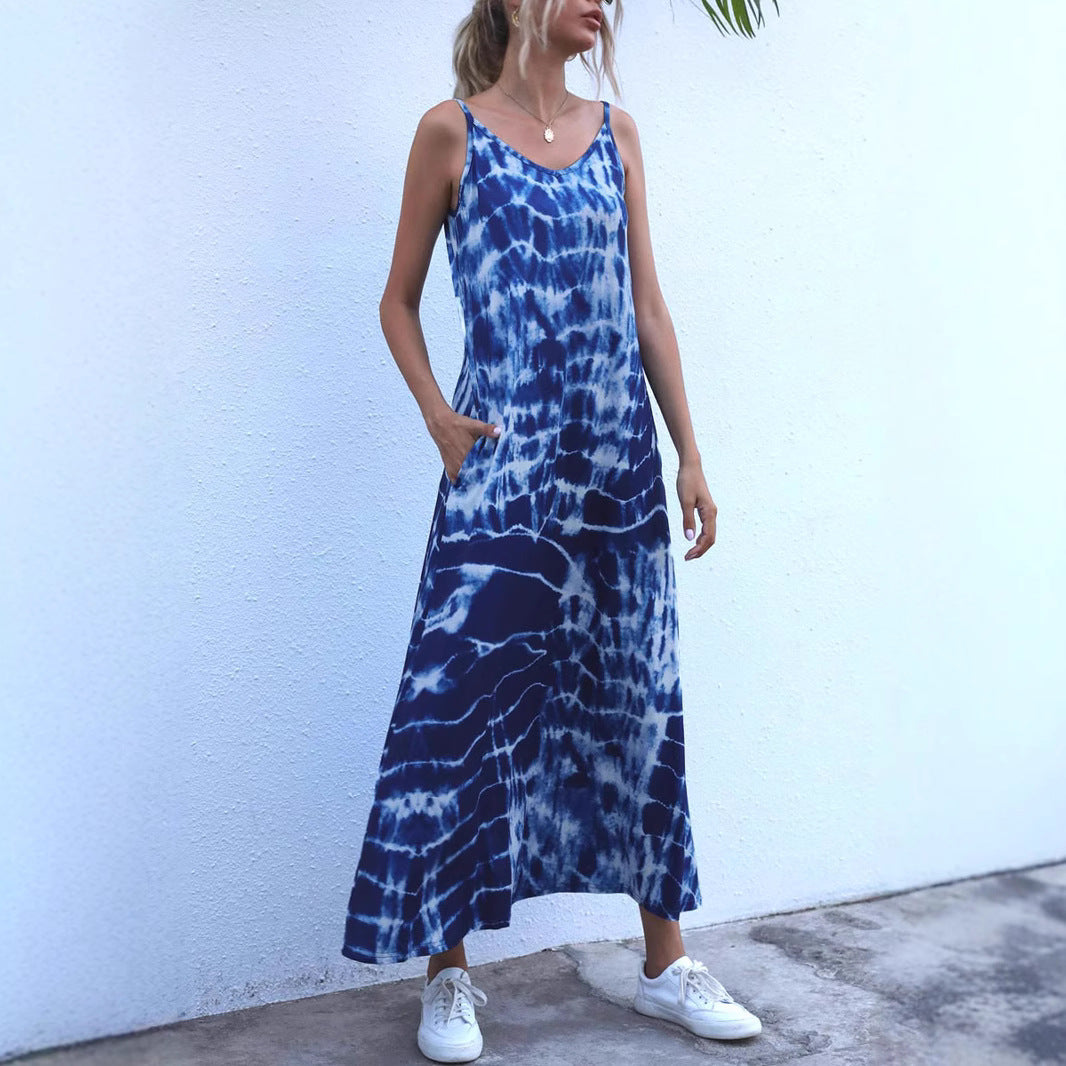 Damer Långt sommarklännng i elastisk jersey med asymmetrisk skärning och praktiska fickor Mirla-Eva Jonsson