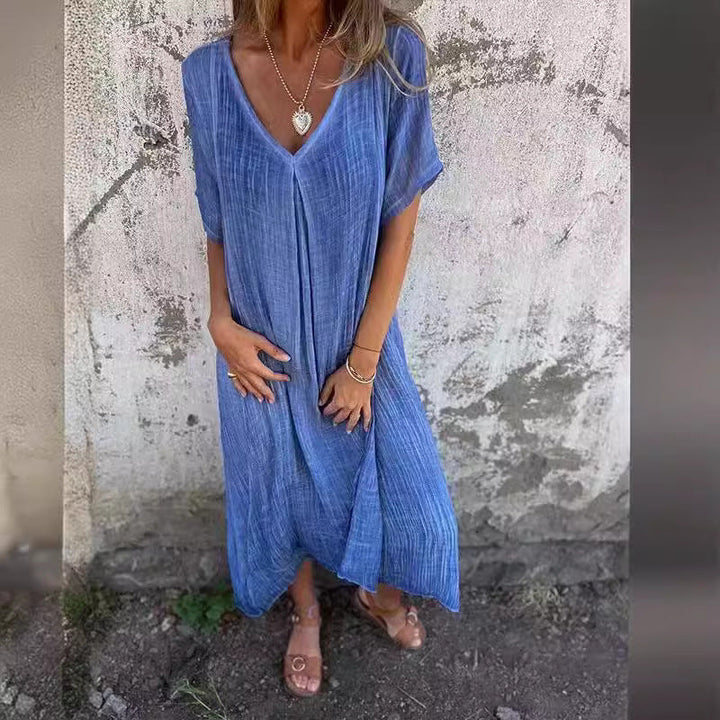 Damer Lätt linneklänning med V-ringning och sidfickor Mirla-Eva Jonsson