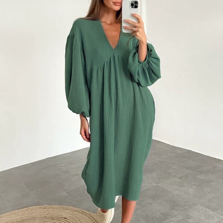 Damer Lätt oversized klänning med voluminösa ärmar och V-ringning Mirla-Eva Jonsson