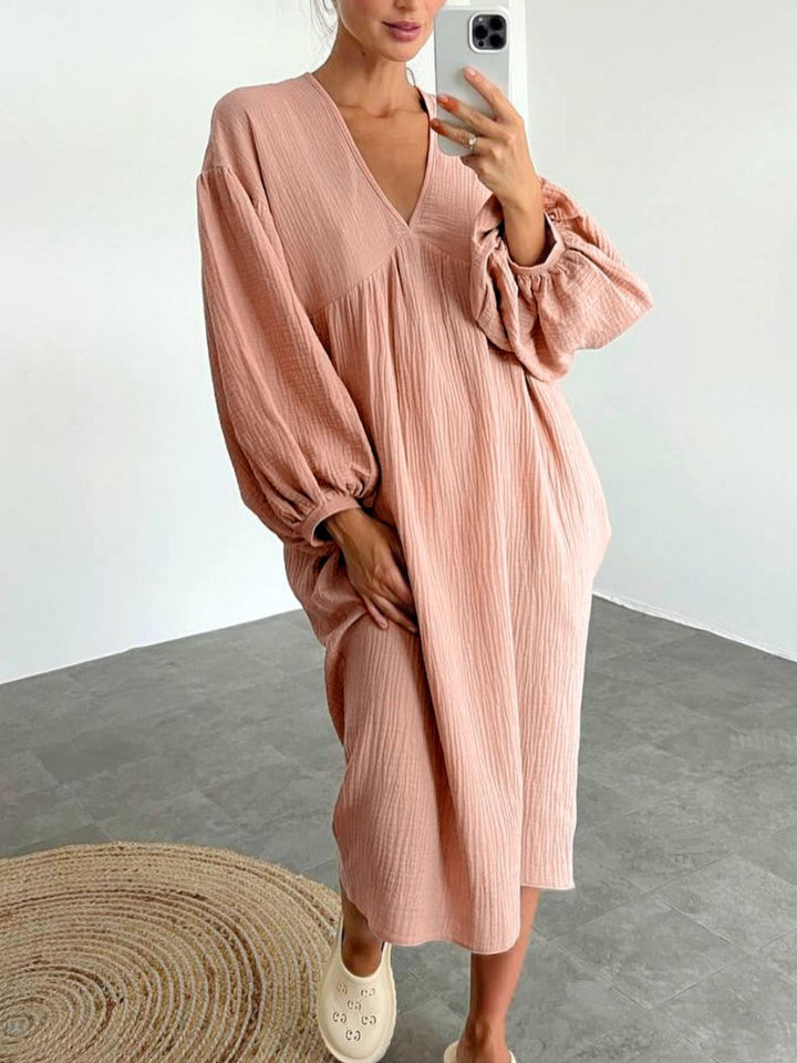 Damer Lätt oversized klänning med voluminösa ärmar och V-ringning Mirla-Eva Jonsson