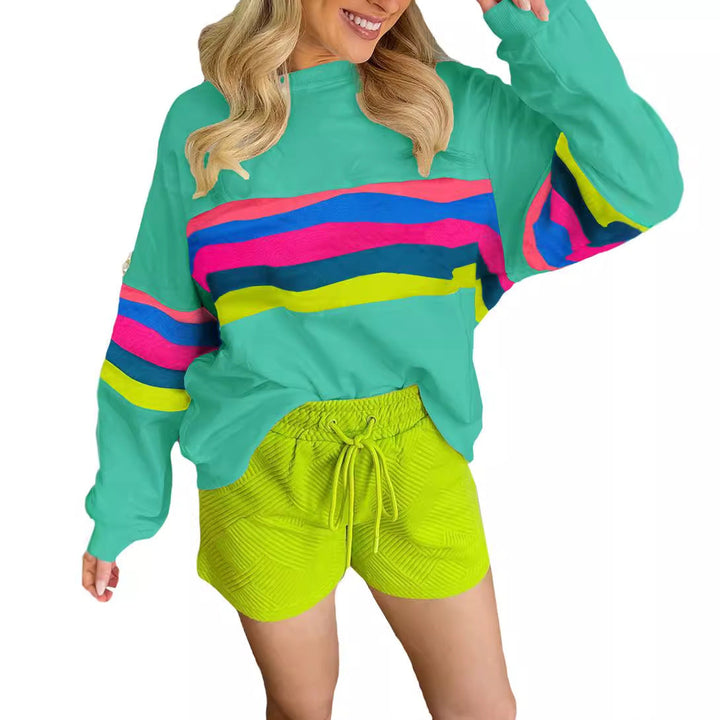 Damer Lätt oversized sweatshirt med färgglada ränder och djup rund halsringning Mirla-Eva Jonsson