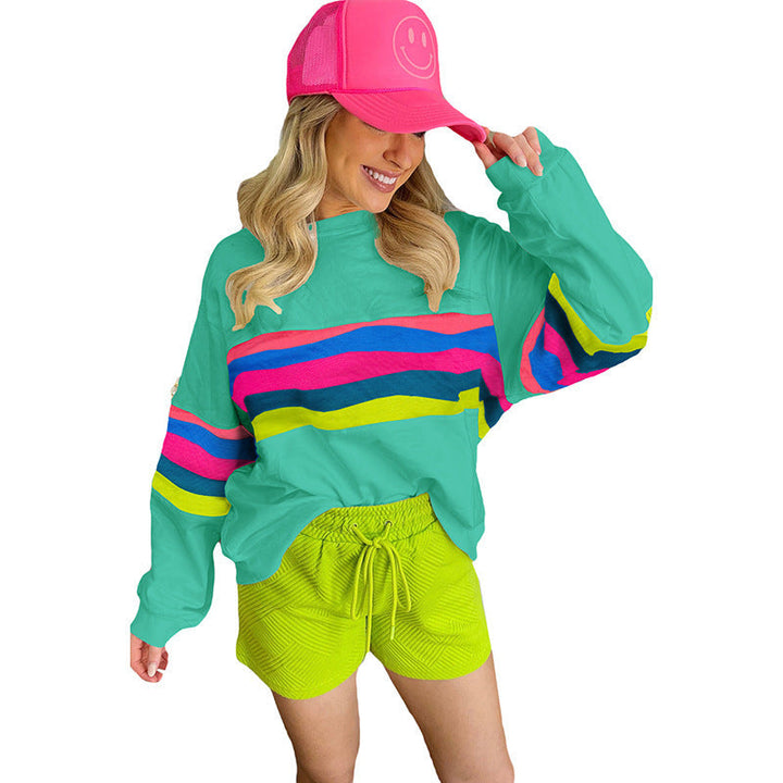 Damer Lätt oversized sweatshirt med färgglada ränder och djup rund halsringning Mirla-Eva Jonsson