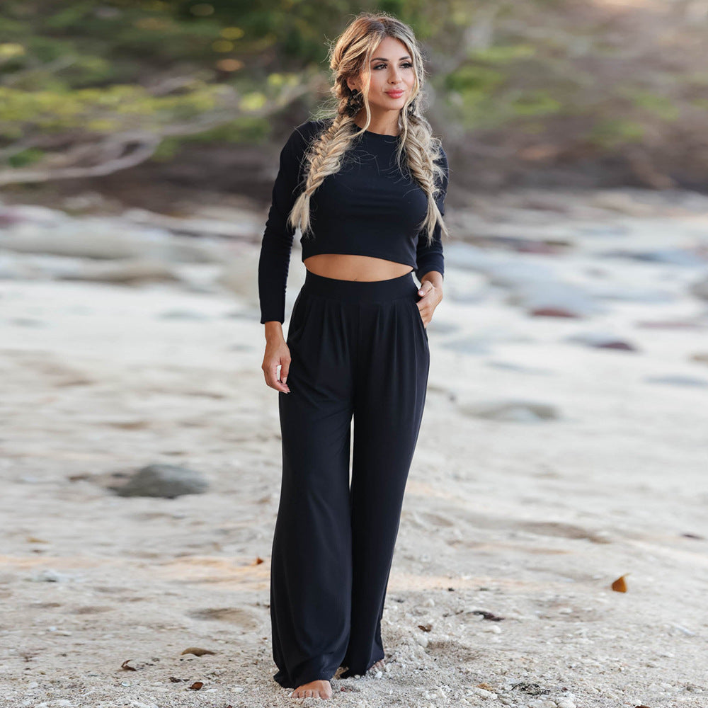 Damer Lättsam Wide-Leg Jumpsuit med långa ärmar och praktiska fickor Eva Jonsson-Eva Jonsson