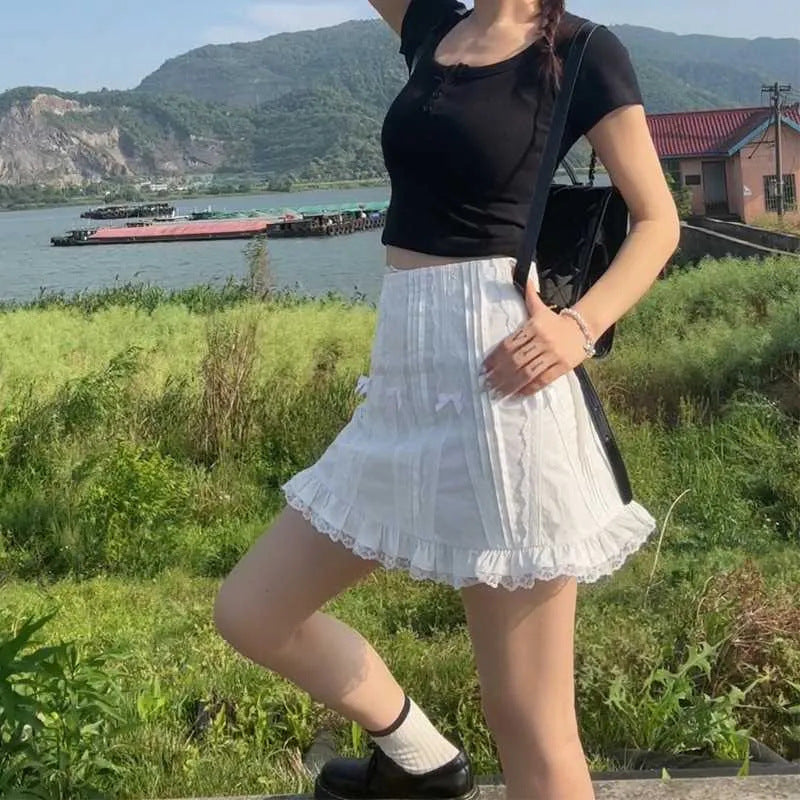 Damer Lekfull Mini kjol med volangdetaljer och elastisk midja Eva Jonsson-Eva Jonsson
