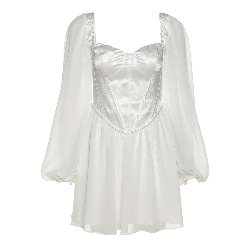 Damer Lekfull miniklänning med elegant bustier-overdel och voluminösa ärmar Eva Jonsson-Eva Jonsson