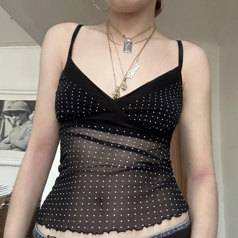 Damer Lekfull spaghetti-top med transparenta accenter och prickar Mirla-Eva Jonsson