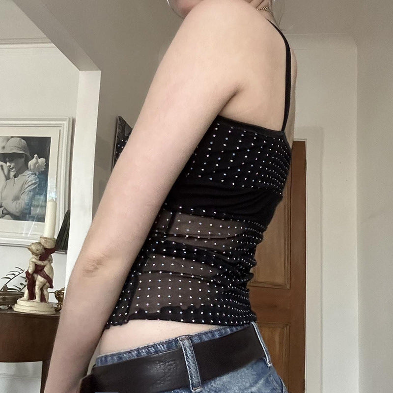 Damer Lekfull spaghetti-top med transparenta accenter och prickar Mirla-Eva Jonsson