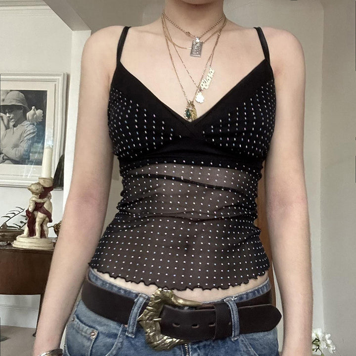 Damer Lekfull spaghetti-top med transparenta accenter och prickar Mirla-Eva Jonsson
