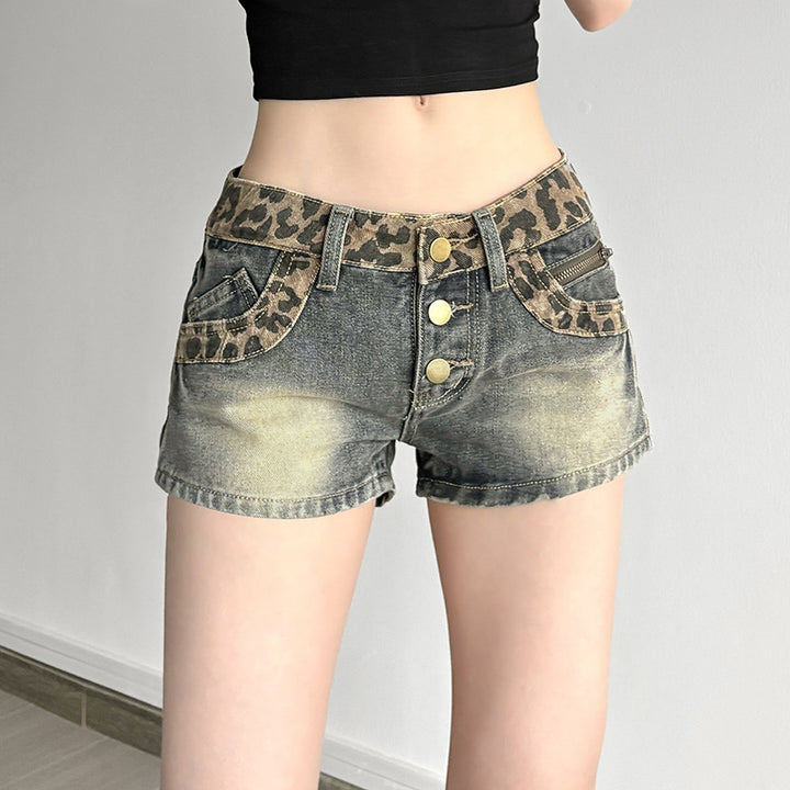 Damer Leopardmönstrade Denimshorts med knappdetaljer och elastisk midja Mirla-Eva Jonsson