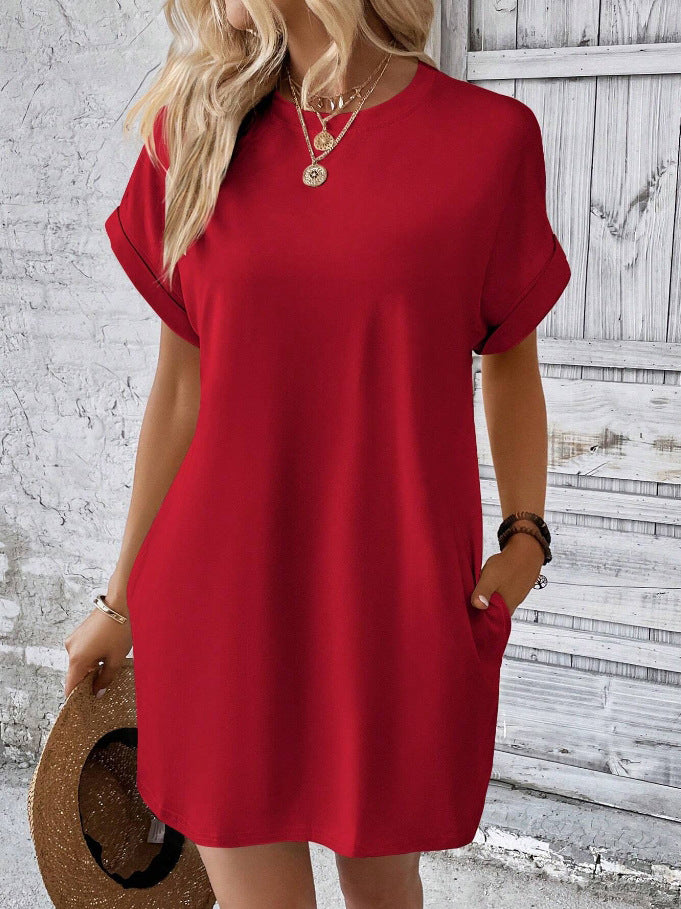 Damer Löst T-shirt-klänning med praktiska fickor och avslappnad design Mirla-Eva Jonsson