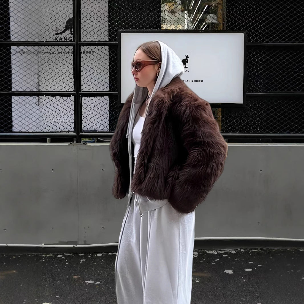 Damer Lyxig Konstpälsjacka med voluminösa ärmar och elegant snitt Mirla-Eva Jonsson