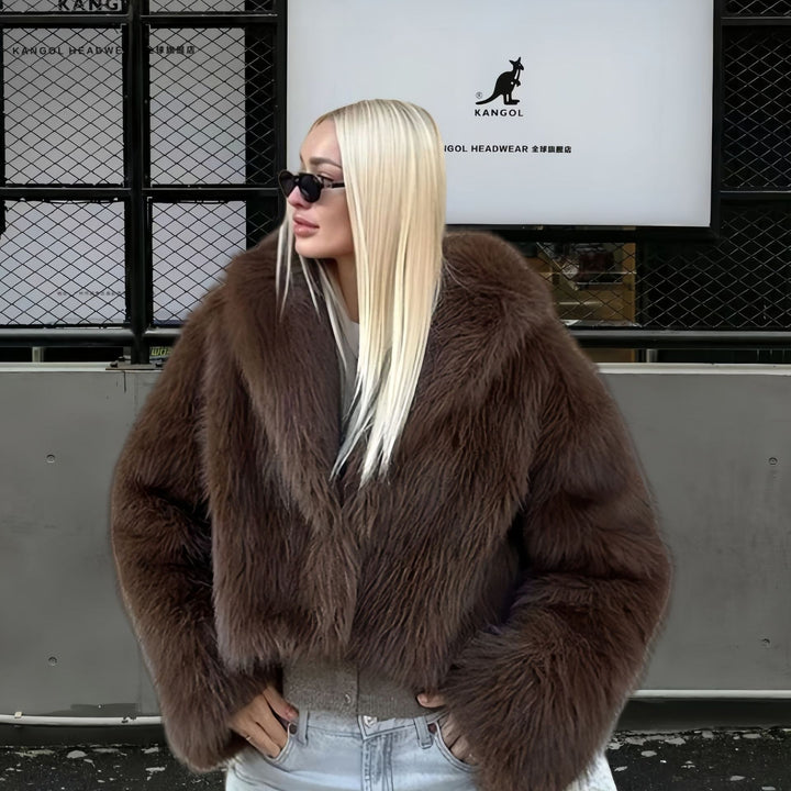 Damer Lyxig Konstpälsjacka med voluminösa ärmar och elegant snitt Mirla-Eva Jonsson